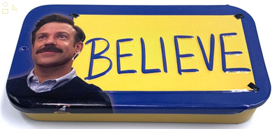 Ted Lasso Believe in Believe Blue Raspberry Flavored Candy - (1) Collectible Slide off Top Tin Filled with Candies Featuring Ted Lasso