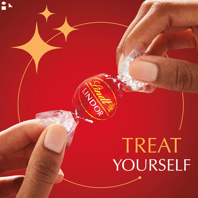 Lindt LINDOR Milk Chocolate Candy Truffles, Milk Chocolate with Smooth, Melting Truffle Center, 5.1 Oz. Bag